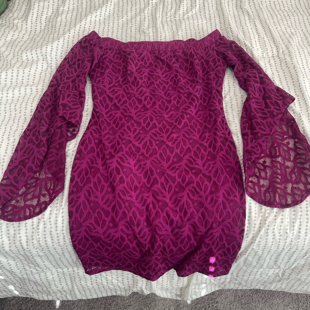 Magenta/ Dark pink Bebe short dress with long sleeves.